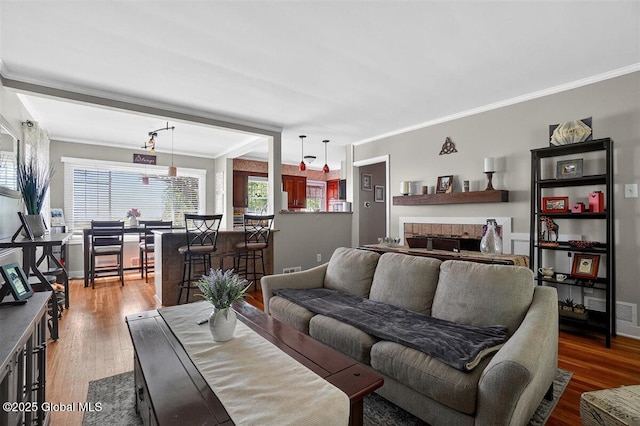 47 Mountainview Ter, North Greenbush, NY 12144 - living area featuring crown molding and wood finished floors