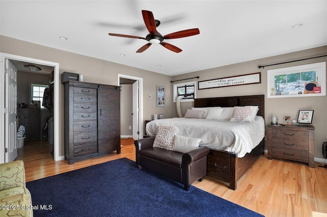 47 Mountainview Ter, North Greenbush, NY 12144 - bedroom with multiple windows, light wood-type flooring, and a ceiling fan
