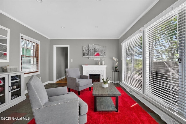 47 Mountainview Ter, North Greenbush, NY 12144 - living area with crown molding, a fireplace, and wood finished floors