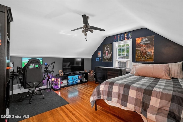 47 Mountainview Ter, North Greenbush, NY 12144 - bedroom with wood finished floors, cooling unit, vaulted ceiling, and ceiling fan