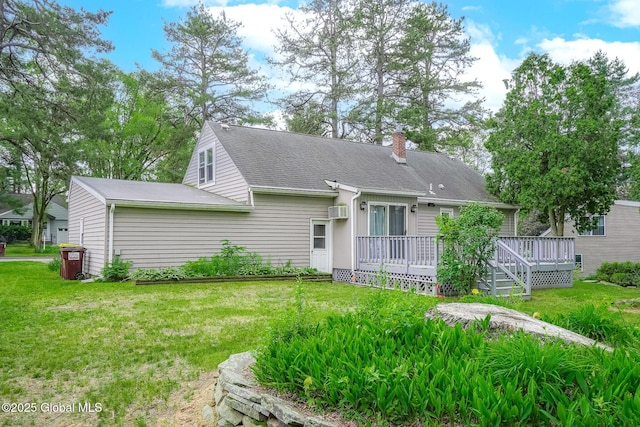 9 Arlene Ave, Guilderland, NY 12203 - view of front of home featuring a wooden deck, a chimney, a front lawn, and roof with shingles