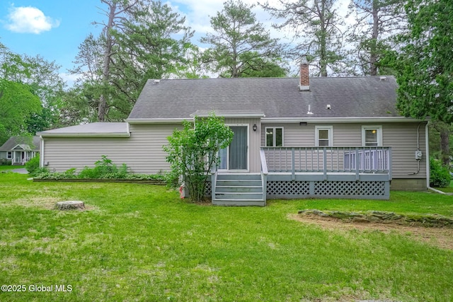 9 Arlene Ave, Guilderland, NY 12203 - rear view of house with a chimney, a deck, and a lawn