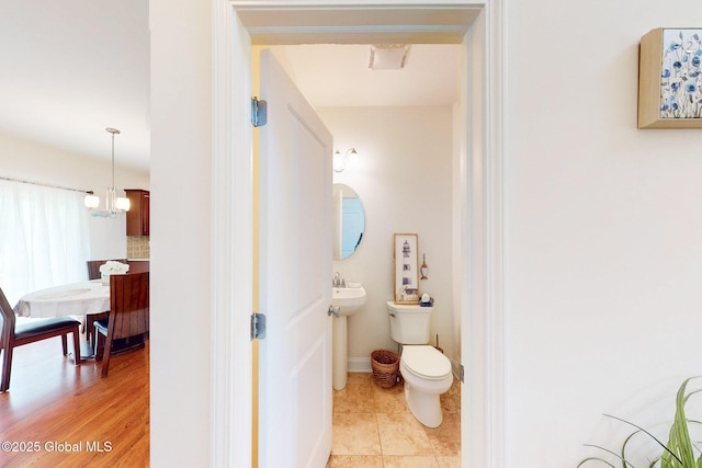 113 Fieldstone Dr, Niskayuna, NY 12304 - bathroom with a chandelier and tile patterned flooring