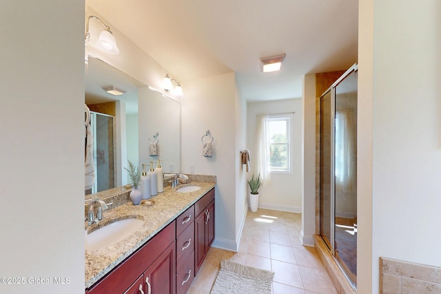 113 Fieldstone Dr, Niskayuna, NY 12304 - full bathroom featuring double vanity, tile patterned flooring, and a shower stall