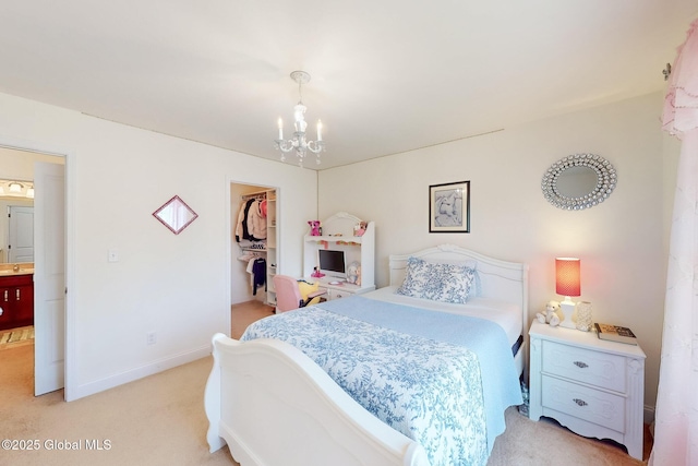 113 Fieldstone Dr, Niskayuna, NY 12304 - bedroom featuring light colored carpet, a chandelier, a spacious closet, and a closet