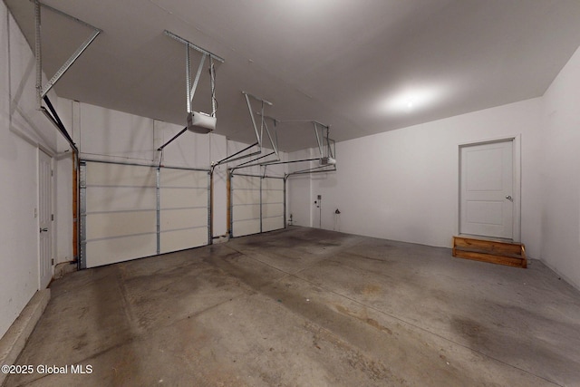 113 Fieldstone Dr, Niskayuna, NY 12304 - garage featuring a garage door opener