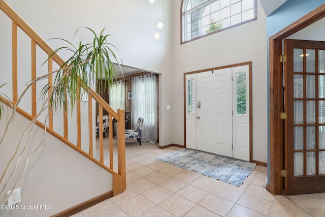 10 Overlook Dr, Wilton, NY 12831 - entrance foyer with stairway, light tile patterned flooring, and a high ceiling