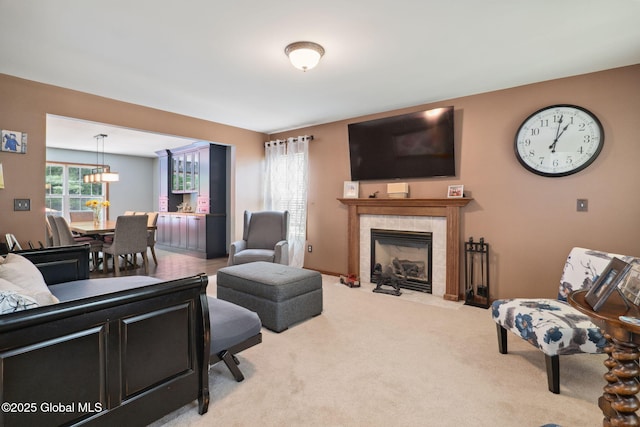 10 Overlook Dr, Wilton, NY 12831 - carpeted living room with a tile fireplace