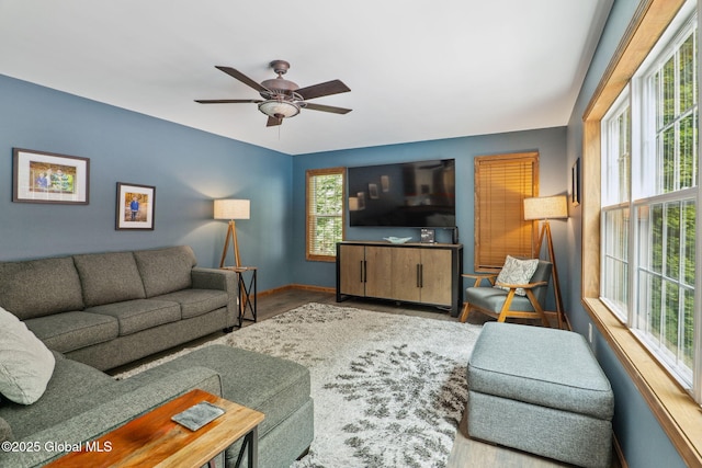 10 Overlook Dr, Wilton, NY 12831 - living room with wood finished floors, healthy amount of natural light, and a ceiling fan