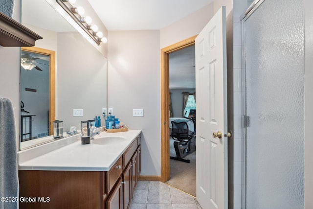 10 Overlook Dr, Wilton, NY 12831 - full bath with vanity, tile patterned floors, an enclosed shower, ensuite bathroom, and ceiling fan