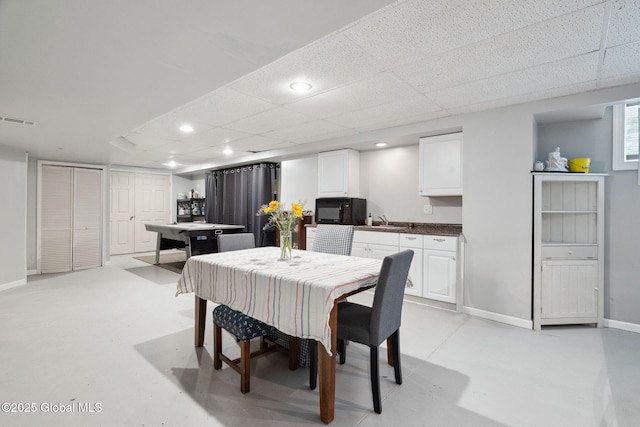10 Overlook Dr, Wilton, NY 12831 - dining area with finished concrete flooring, recessed lighting, and a drop ceiling