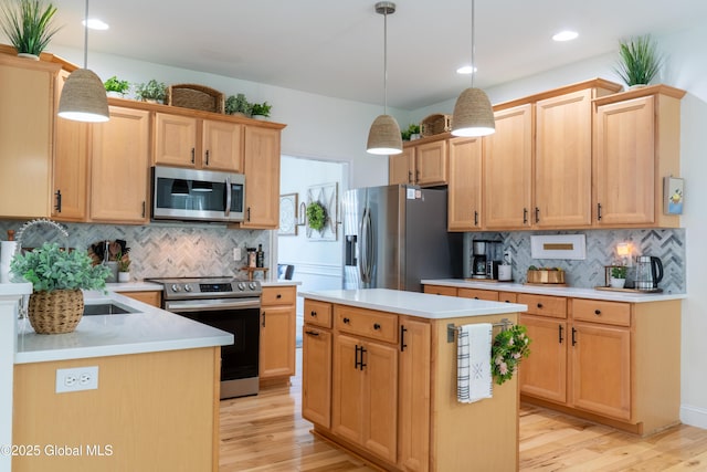 76 Hoffman Ct, Milton, NY 12020 - kitchen with stainless steel appliances, light wood finished floors, tasteful backsplash, and recessed lighting