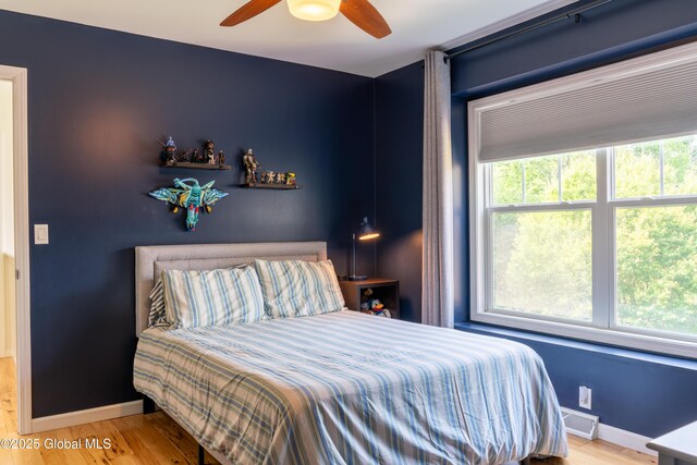 76 Hoffman Ct, Milton, NY 12020 - bedroom featuring wood finished floors and a ceiling fan