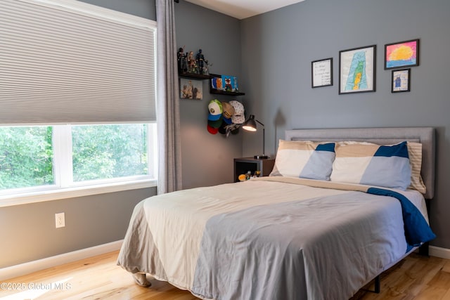76 Hoffman Ct, Milton, NY 12020 - bedroom with wood finished floors and baseboards