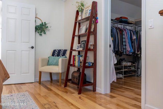 76 Hoffman Ct, Milton, NY 12020 - living area with light wood-style floors and baseboards