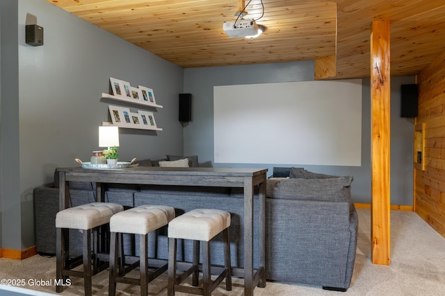 76 Hoffman Ct, Milton, NY 12020 - carpeted living room featuring wooden ceiling and a bar