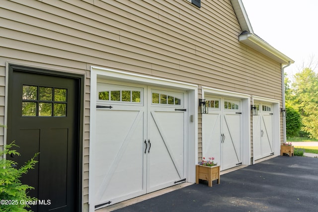 76 Hoffman Ct, Milton, NY 12020 - garage with asphalt driveway