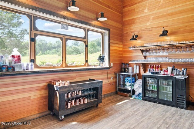 284 Edgemont Rd, Moriah, NY 12960 - indoor dry bar with wood finished floors and wood walls