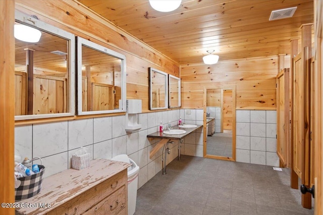 284 Edgemont Rd, Moriah, NY 12960 - bathroom featuring wooden ceiling and wooden walls