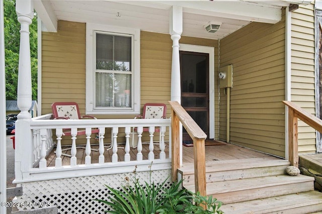 284 Edgemont Rd, Moriah, NY 12960 - property entrance featuring covered porch