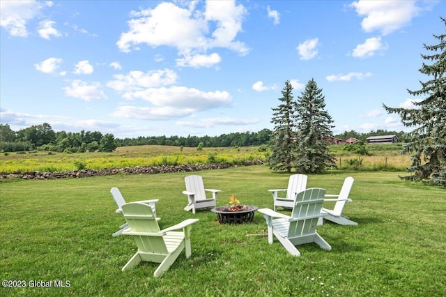 284 Edgemont Rd, Moriah, NY 12960 - view of grassy yard featuring an outdoor fire pit