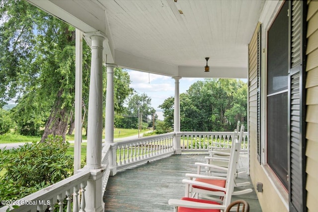 284 Edgemont Rd, Moriah, NY 12960 - porch with view of scattered trees