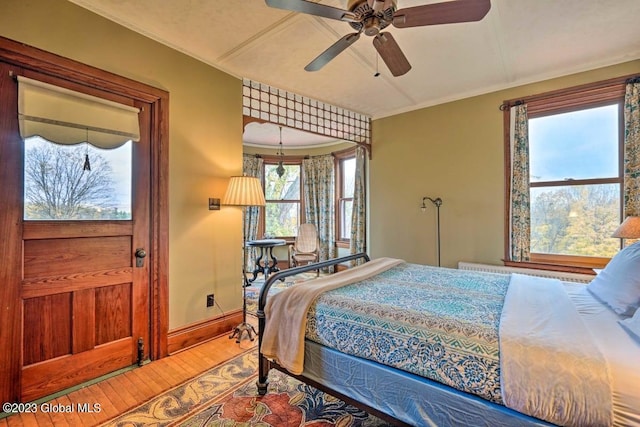 284 Edgemont Rd, Moriah, NY 12960 - bedroom featuring hardwood / wood-style floors and ornamental molding