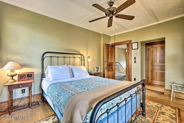 284 Edgemont Rd, Moriah, NY 12960 - bedroom featuring wood-type flooring and ceiling fan