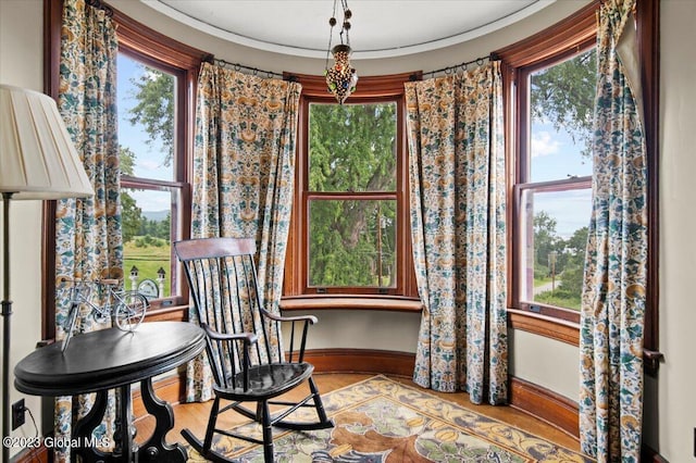 284 Edgemont Rd, Moriah, NY 12960 - living area featuring plenty of natural light and wood finished floors
