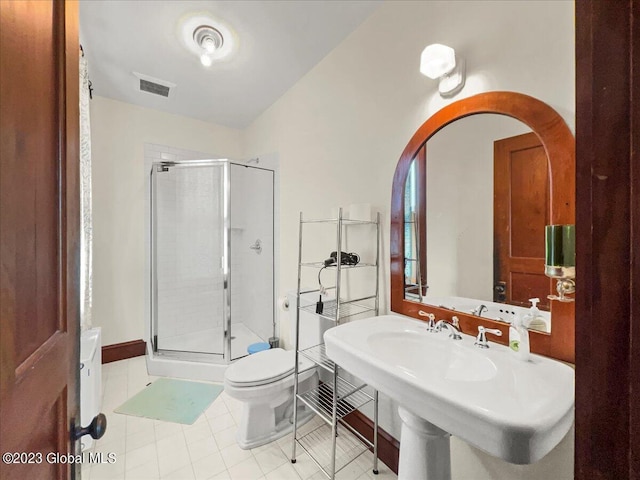 284 Edgemont Rd, Moriah, NY 12960 - bathroom featuring a shower stall and tile patterned floors