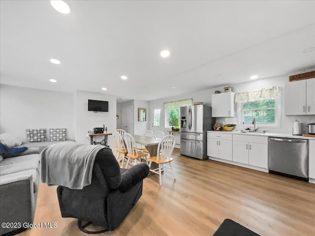 284 Edgemont Rd, Moriah, NY 12960 - living area featuring light wood-style floors and recessed lighting