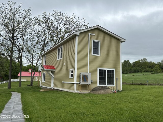 284 Edgemont Rd, Moriah, NY 12960 - view of property exterior featuring a lawn