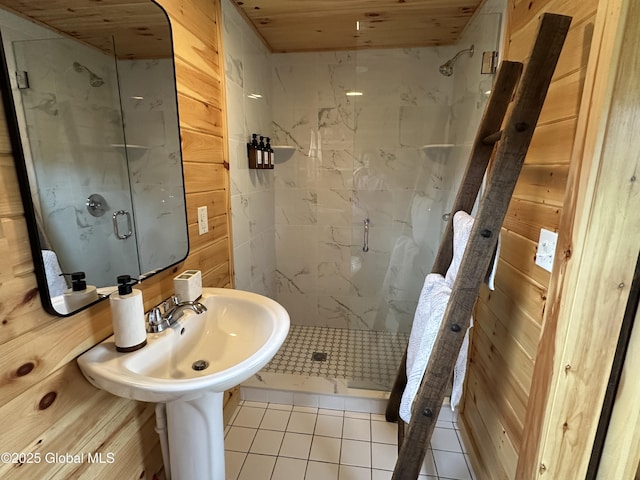 284 Edgemont Rd, Moriah, NY 12960 - bathroom with tile patterned flooring, a marble finish shower, and wooden walls