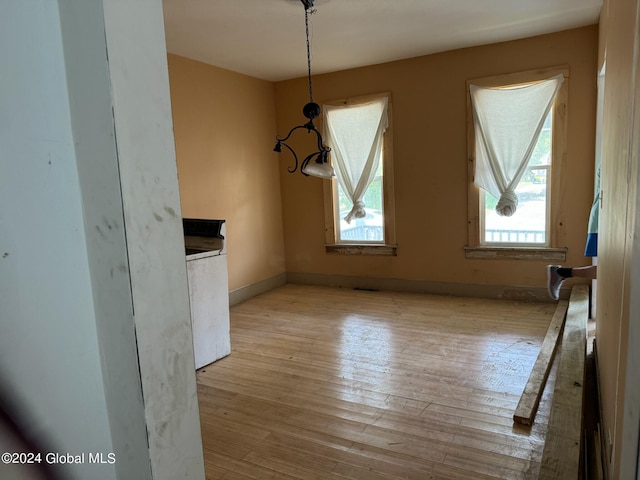 112 Mason St, Johnstown, NY 12095 - unfurnished dining area featuring light wood-style floors and washer / clothes dryer