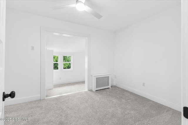2321 1st Ave, Rotterdam, NY 12303 - unfurnished room featuring radiator heating unit, carpet floors, and a ceiling fan