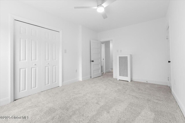 2321 1st Ave, Rotterdam, NY 12303 - unfurnished bedroom featuring carpet flooring, a closet, and a ceiling fan