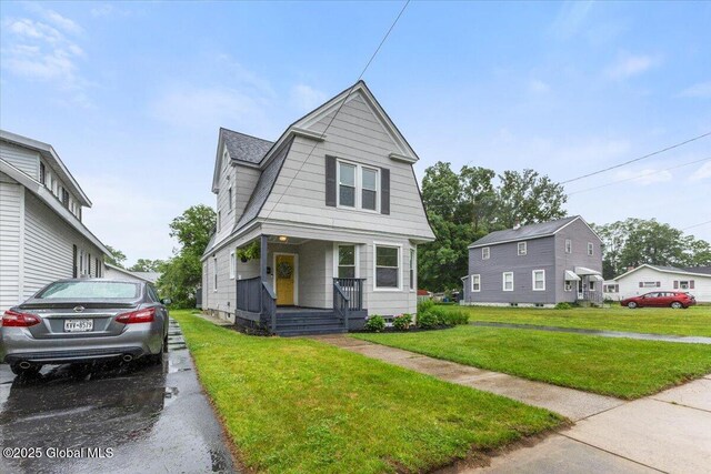 2321 1st Ave, Rotterdam, NY 12303 - colonial inspired home with a porch, a front lawn, and a gambrel roof