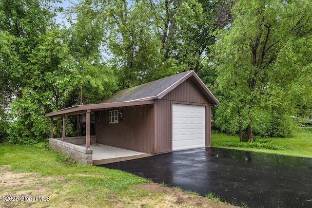 2321 1st Ave, Rotterdam, NY 12303 - garage with a garage and driveway