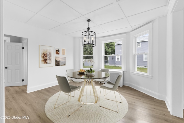 2321 1st Ave, Rotterdam, NY 12303 - dining space with a chandelier and light wood-style floors