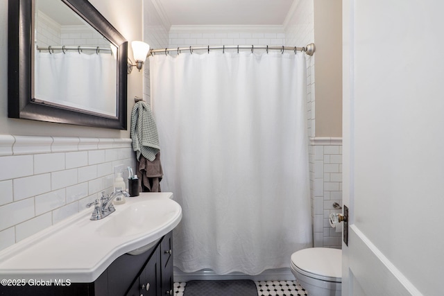 462-470 2nd Ave, Troy, NY 12182 - full bath with tile walls, crown molding, vanity, tile patterned floors, and wainscoting