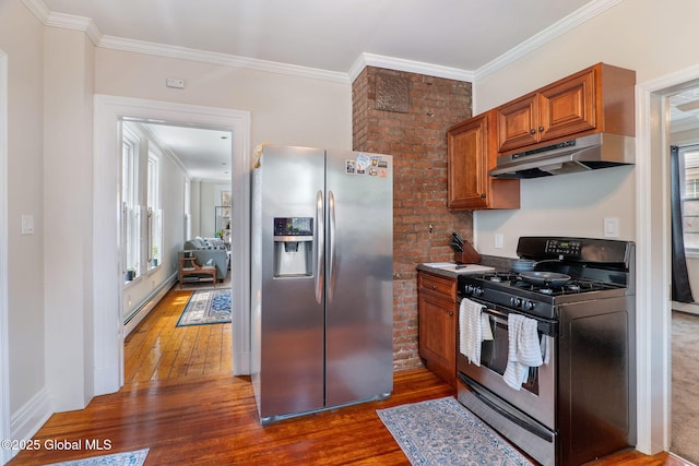 462-470 2nd Ave, Troy, NY 12182 - kitchen featuring appliances with stainless steel finishes, under cabinet range hood, wood-type flooring, brown cabinets, and ornamental molding