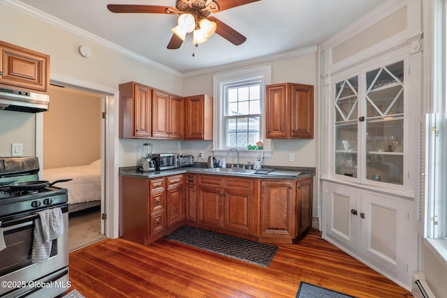 462-470 2nd Ave, Troy, NY 12182 - kitchen with gas range, baseboard heating, wood finished floors, under cabinet range hood, and brown cabinets