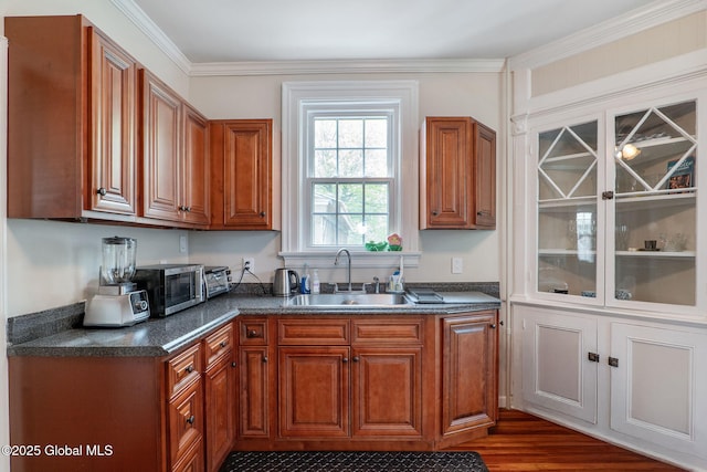 462-470 2nd Ave, Troy, NY 12182 - kitchen with dark countertops, brown cabinets, ornamental molding, wood finished floors, and stainless steel microwave