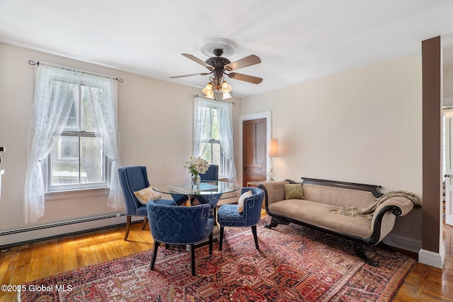 462-470 2nd Ave, Troy, NY 12182 - dining space with baseboard heating, a ceiling fan, and wood finished floors
