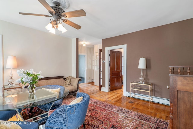 462-470 2nd Ave, Troy, NY 12182 - living area featuring a baseboard radiator, wood finished floors, ceiling fan, and a baseboard heating unit