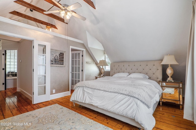 462-470 2nd Ave, Troy, NY 12182 - bedroom featuring vaulted ceiling, wood-type flooring, multiple windows, and a ceiling fan