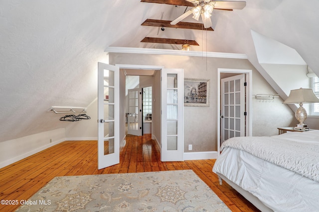 462-470 2nd Ave, Troy, NY 12182 - bedroom featuring french doors, lofted ceiling, and hardwood / wood-style floors