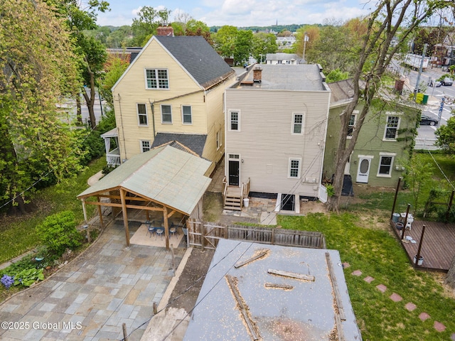 462-470 2nd Ave, Troy, NY 12182 - rear view of house featuring a chimney and concrete driveway
