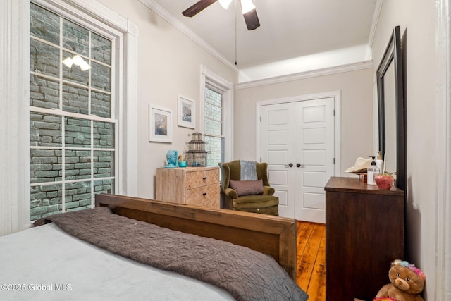 462-470 2nd Ave, Troy, NY 12182 - bedroom featuring ornamental molding, wood finished floors, ceiling fan, and a closet