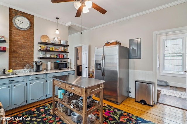 462-470 2nd Ave, Troy, NY 12182 - kitchen with stainless steel appliances, electric panel, open shelves, ceiling fan, and light wood-style floors